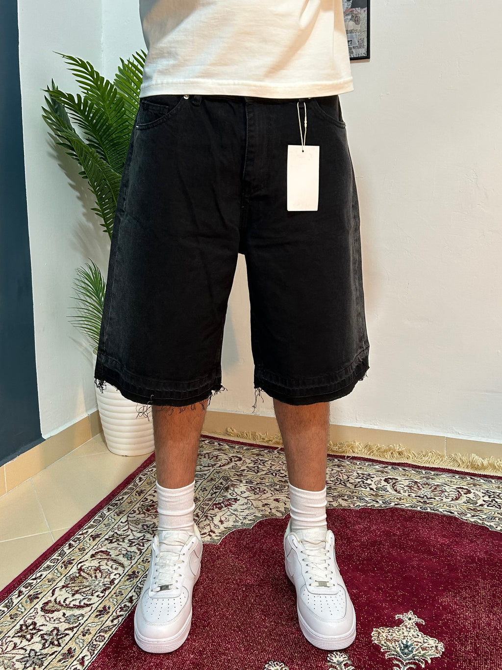 black baggy jeans shorts