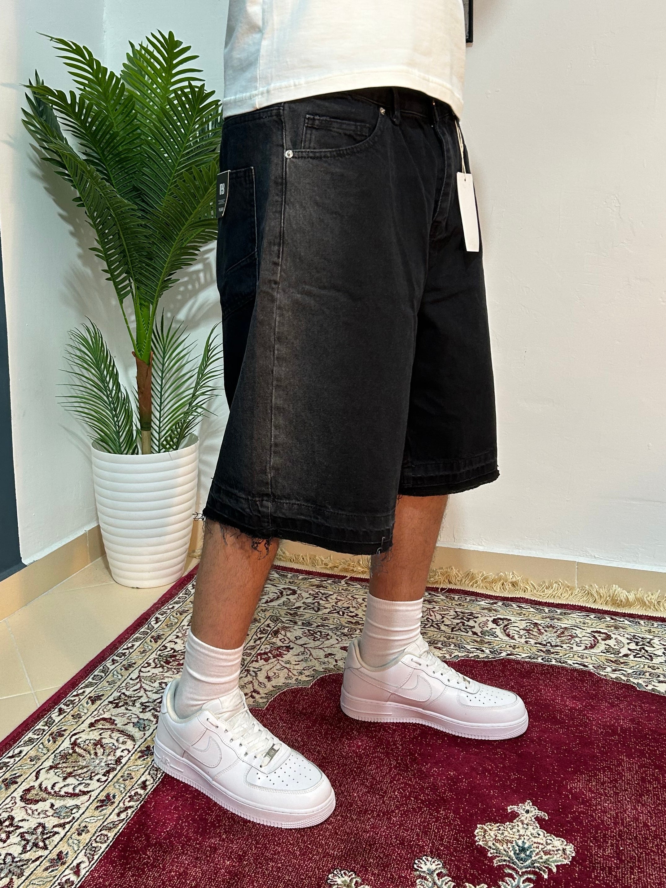 black baggy jeans shorts