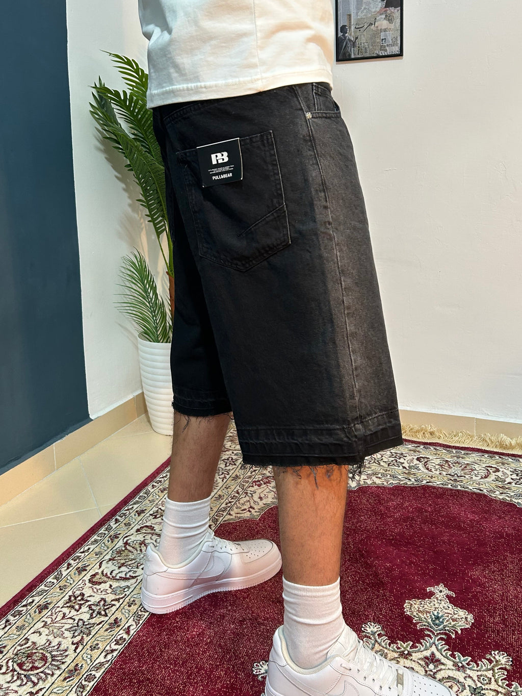 black baggy jeans shorts